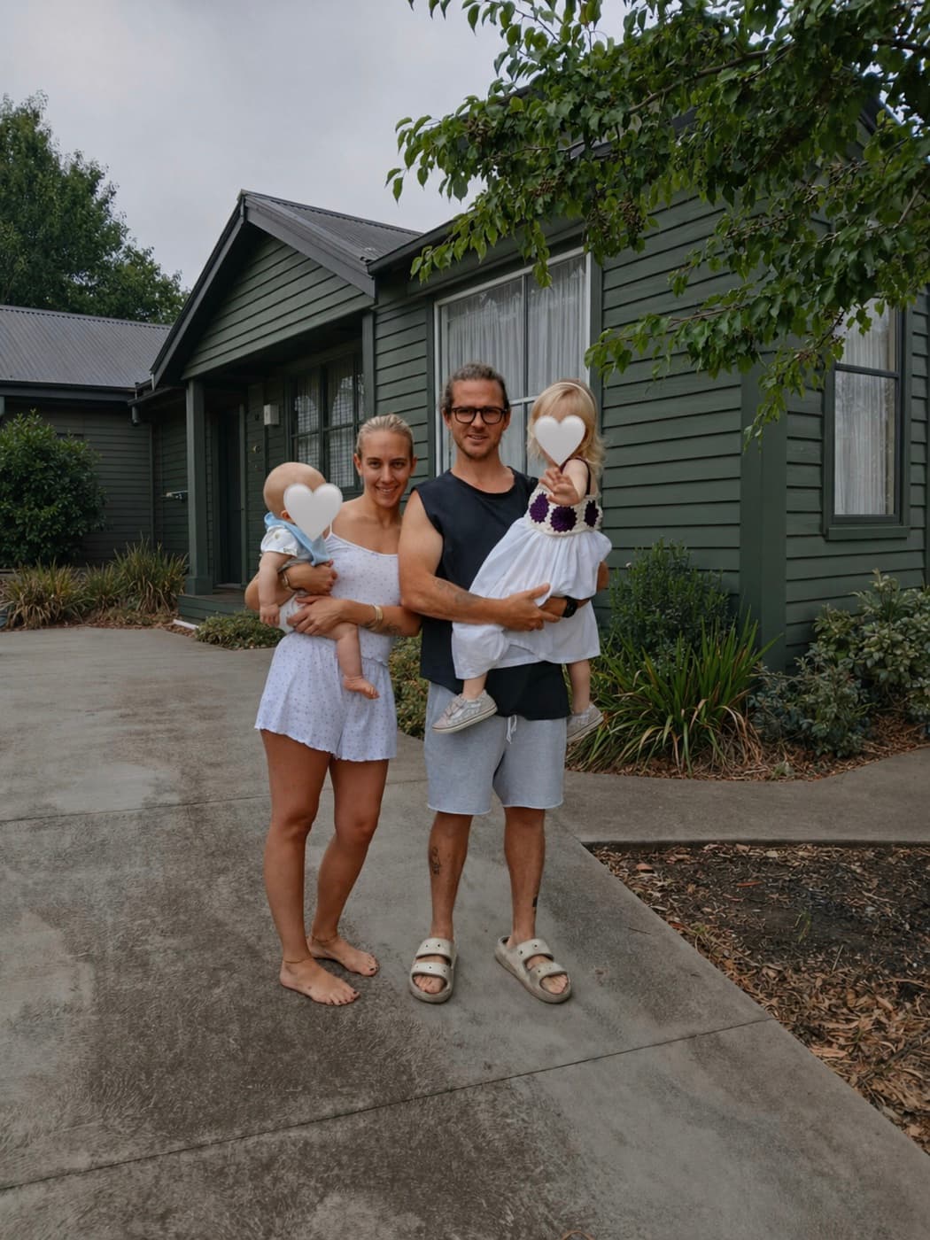 Chelsea and Jaryd with their two kids outside their home in Melbourne