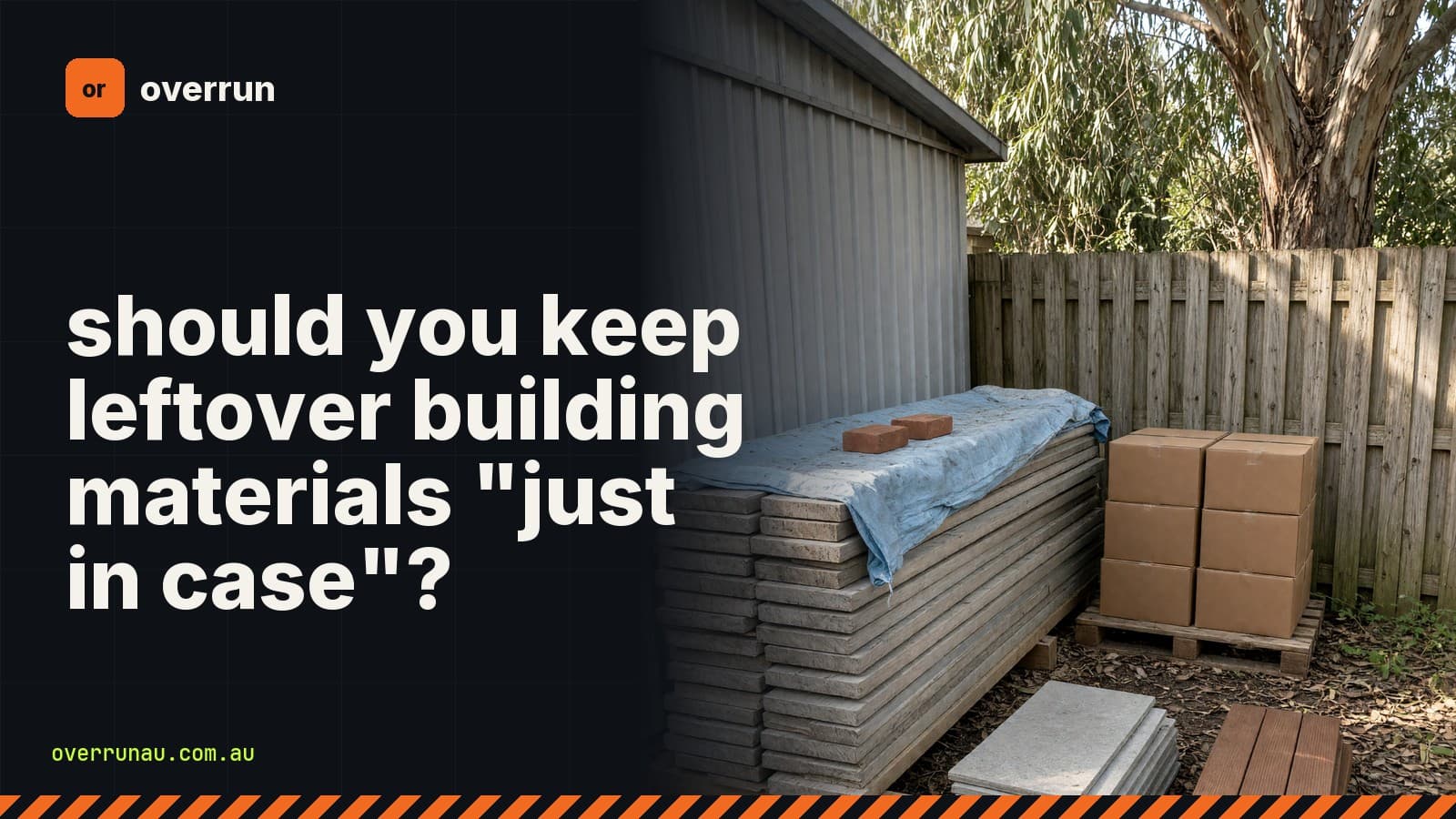 Leftover building materials stored beside a backyard shed: lengths under a blue tarp, boxes on a pallet, pavers and decking boards